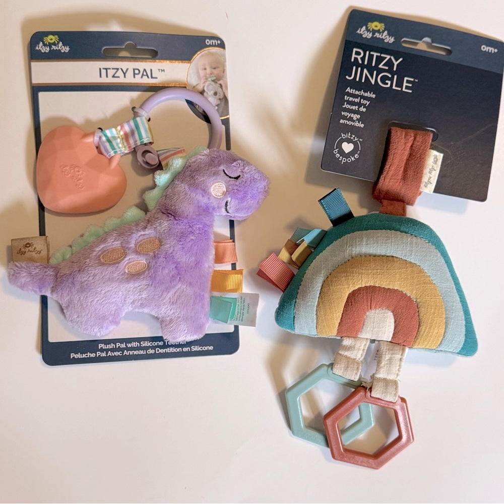 Itzy Ritzy Bundle - Dinosaur Plush Pal with Teether & Rainbow Ritzy Jingle NWT